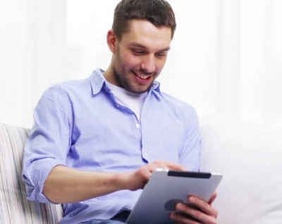 young man using a tablet