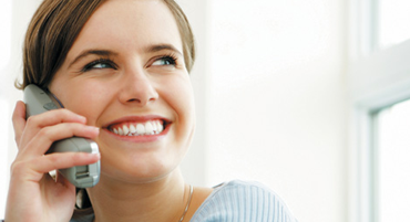 woman at home making a phone call